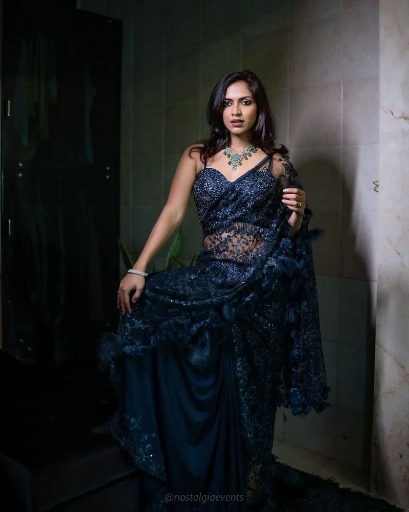 Actress amalapaul black color transparent saree stunning photos gone viral