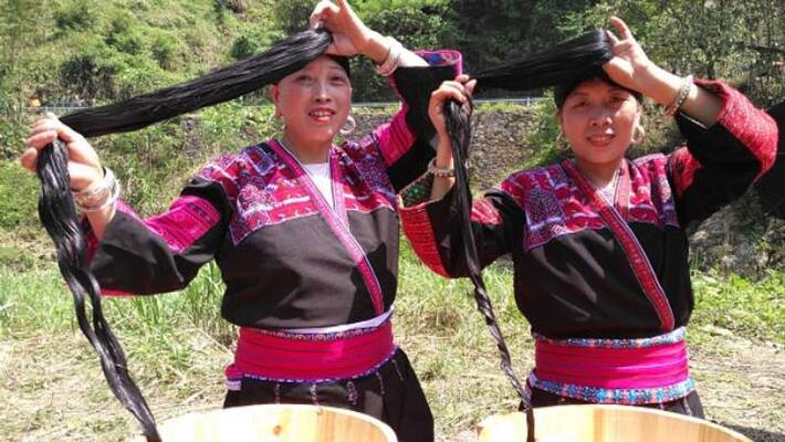 Huangluo Yao village with long haired women Huangluo Yao village with long haired women