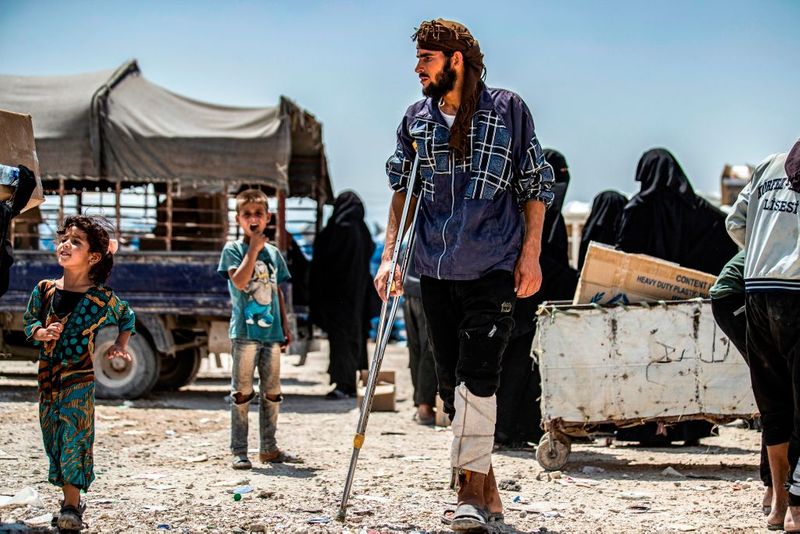 a tented city home to the wives and children of IS