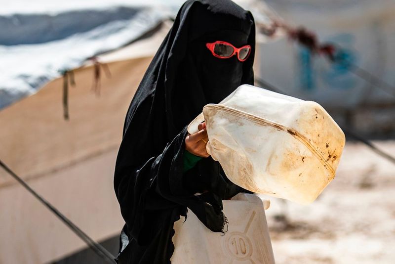 a tented city home to the wives and children of IS