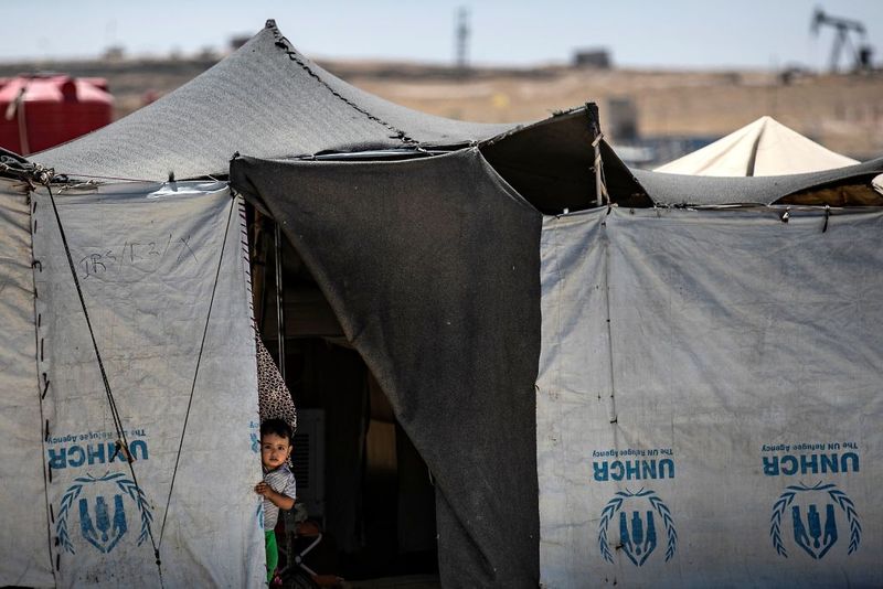 a tented city home to the wives and children of IS