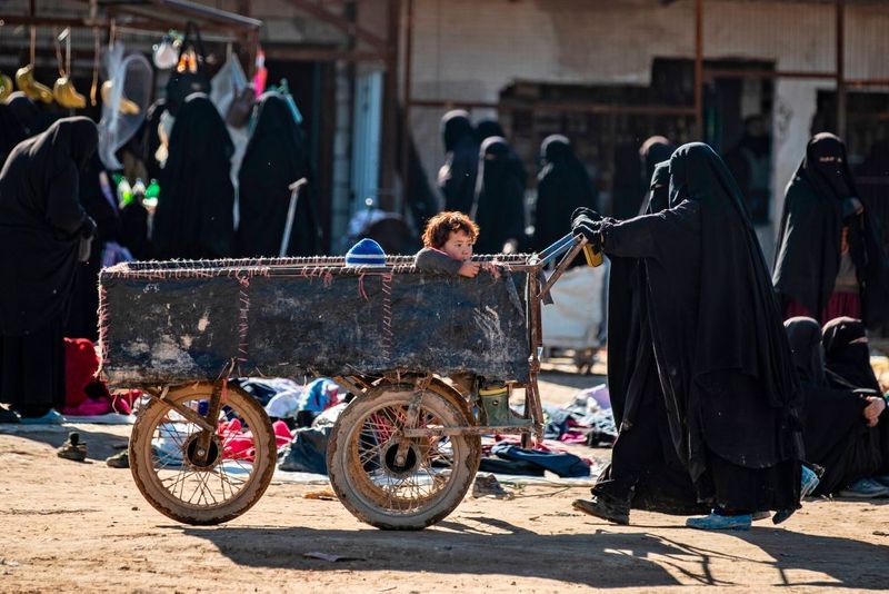 a tented city home to the wives and children of IS