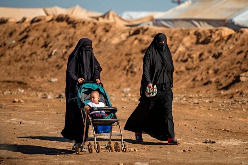 a tented city home to the wives and children of IS