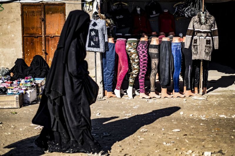 a tented city home to the wives and children of IS