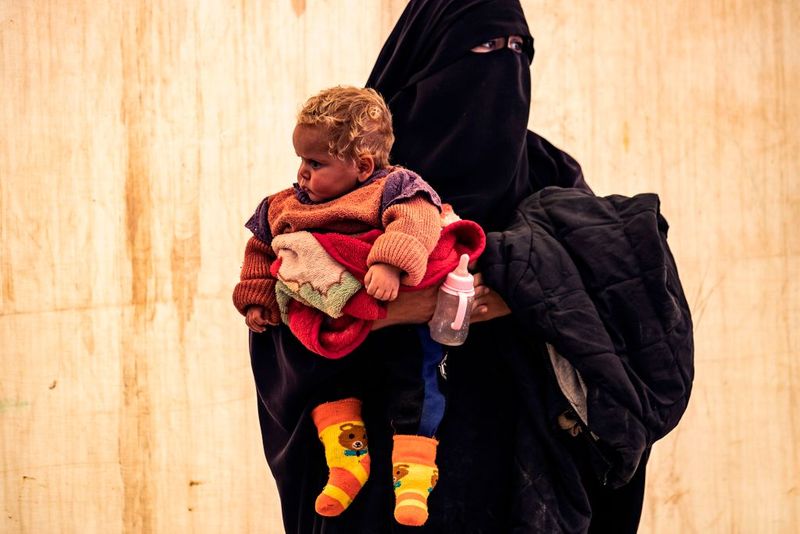 a tented city home to the wives and children of IS