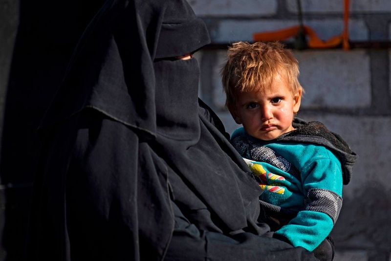 a tented city home to the wives and children of IS