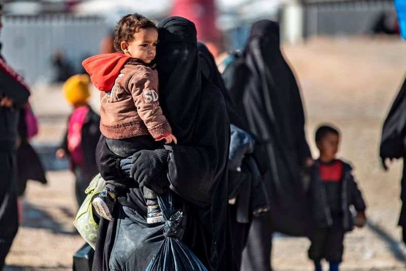 a tented city home to the wives and children of IS