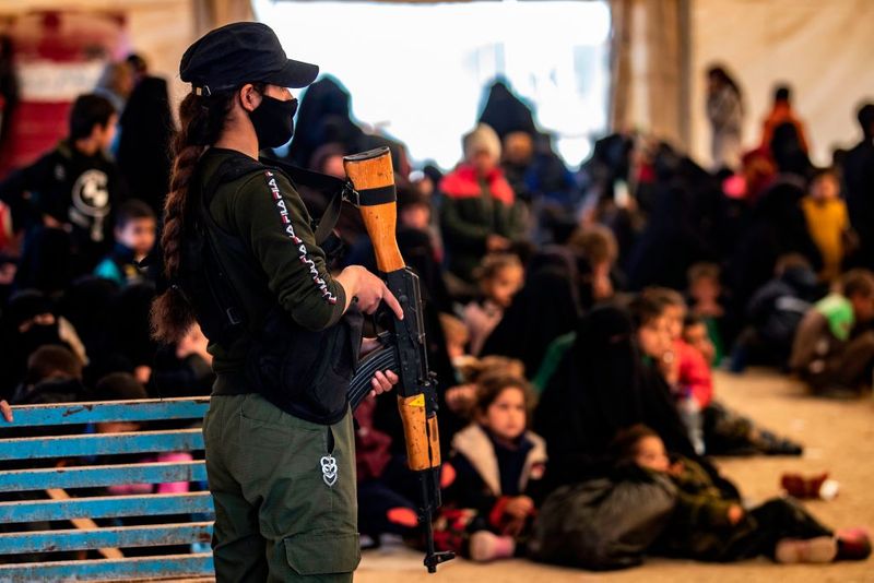a tented city home to the wives and children of IS
