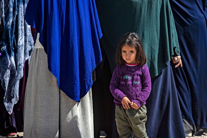a tented city home to the wives and children of IS