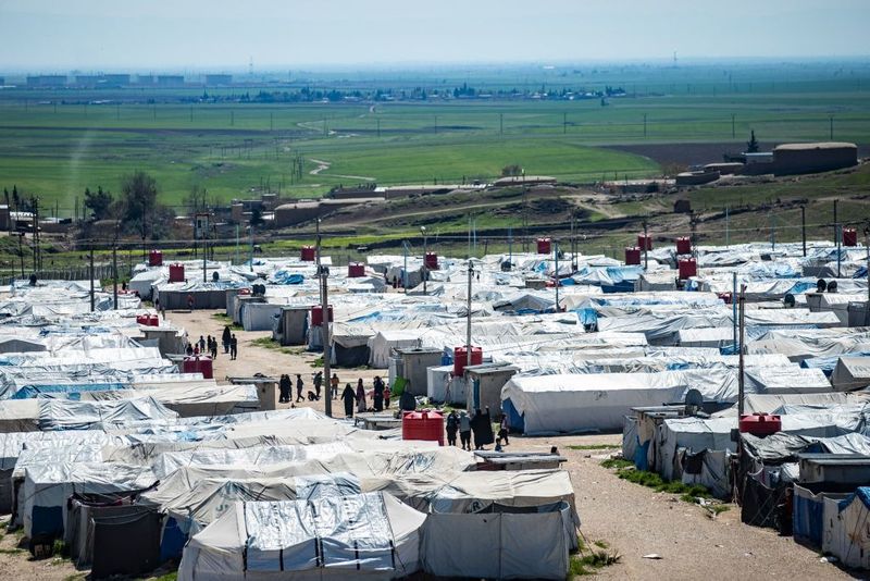 a tented city home to the wives and children of IS