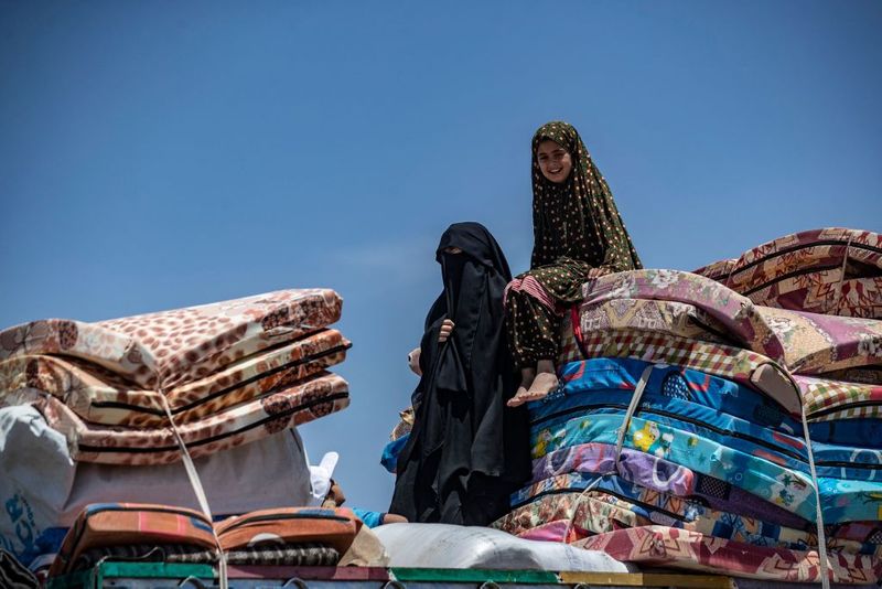 a tented city home to the wives and children of IS