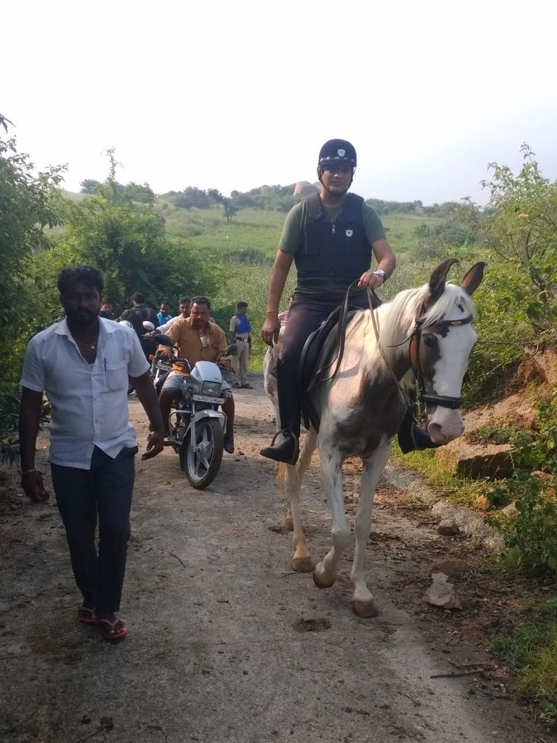 Koppal DC Vikas Kishore Suralkal Visits Kummatadurga Hilll on Horse in Gangavati grg