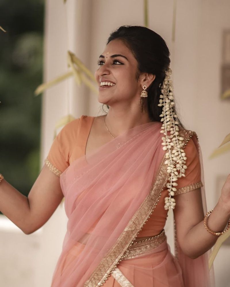 Elegant version of Actress Indhuja half saree look latest photos