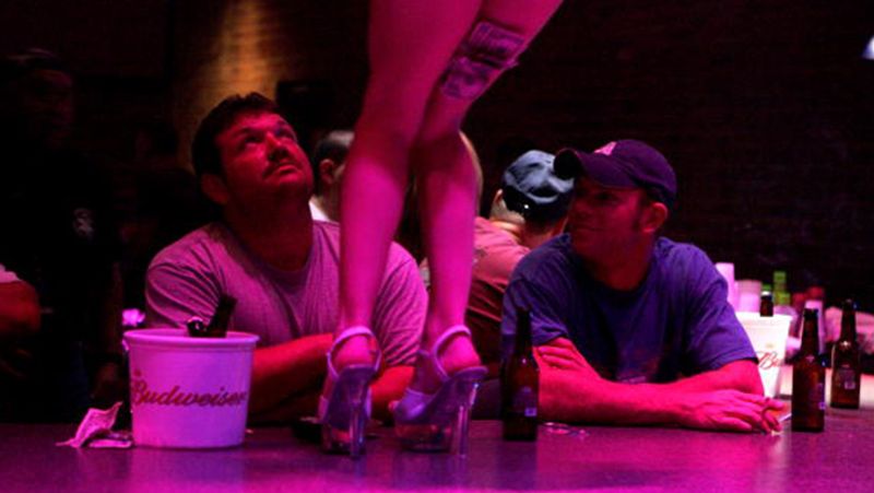 China strippers dance during a funeral in Taiwan