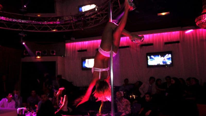 China strippers dance during a funeral in Taiwan