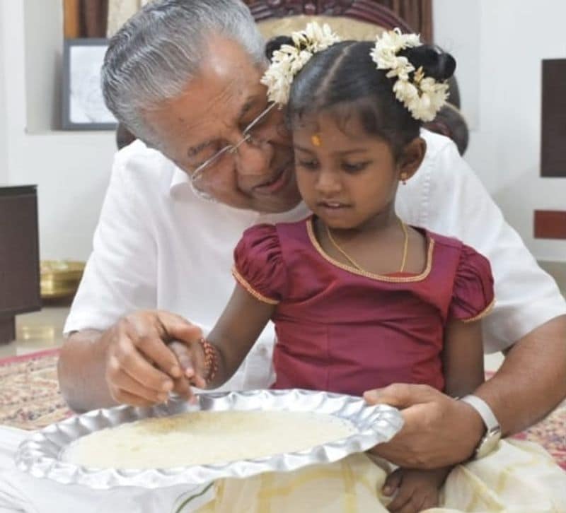 Vijayadashami Kerala CM Pinarayi vijayan initiates kids into world of letters on vidyarabham dpl