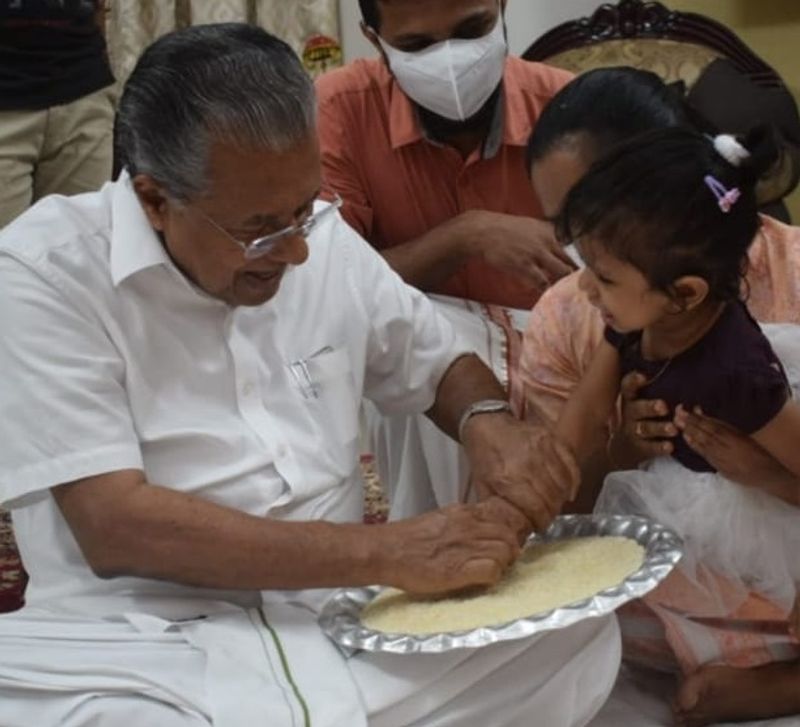 Vijayadashami Kerala CM Pinarayi vijayan initiates kids into world of letters on vidyarabham dpl