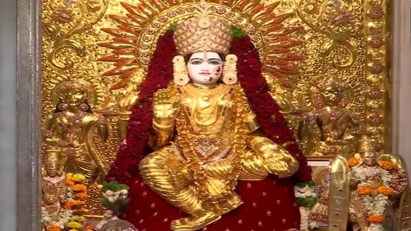 Goddess is dressed in a 16 kg gold sari at Mahalaxmi temple in Pune and Sindoor Khela festival is celebrated in Bengal