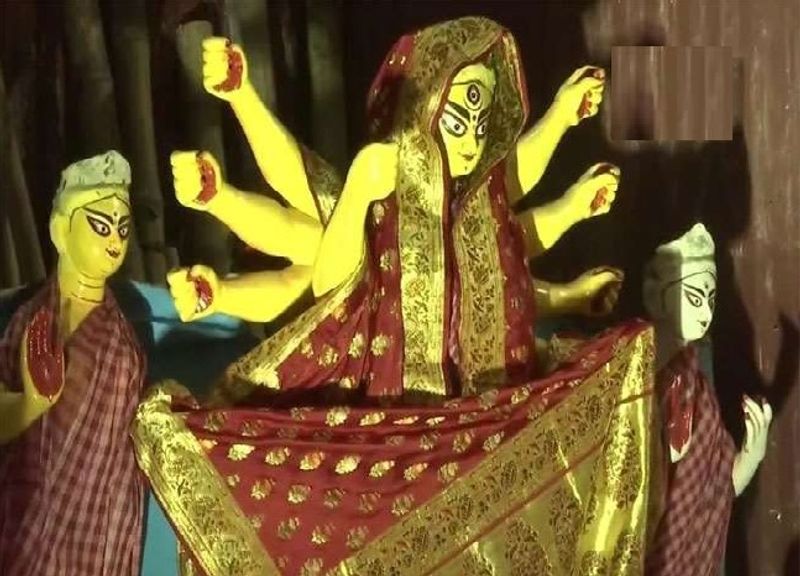 Goddess is dressed in a 16 kg gold sari at Mahalaxmi temple in Pune and Sindoor Khela festival is celebrated in Bengal