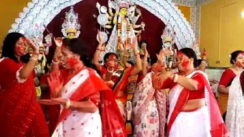Goddess is dressed in a 16 kg gold sari at Mahalaxmi temple in Pune and Sindoor Khela festival is celebrated in Bengal