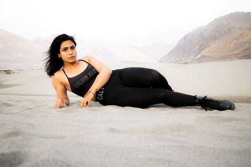 Nandini rai bikini poses in swimming pool rising heat