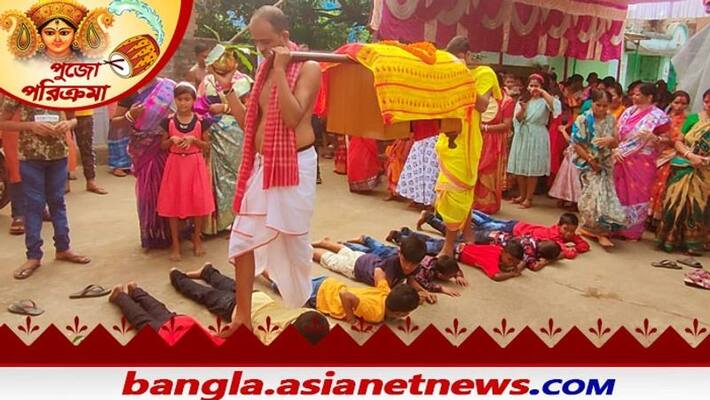Children lied down on ground in prayer for corona free world before idol immersion in Purulia bmm Children lied down on ground in prayer for corona free world before idol immersion in Purulia bmm