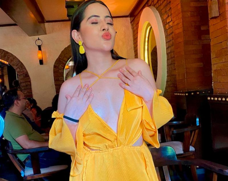 Bigg Boss OTT fame Urfi Javed steps out in hot deep neck cut out dress dpl