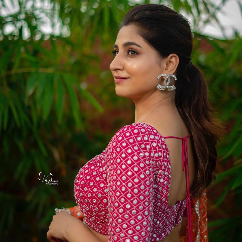 hot anchor varshini sizzles in choli lehanga her latest pics goes viral