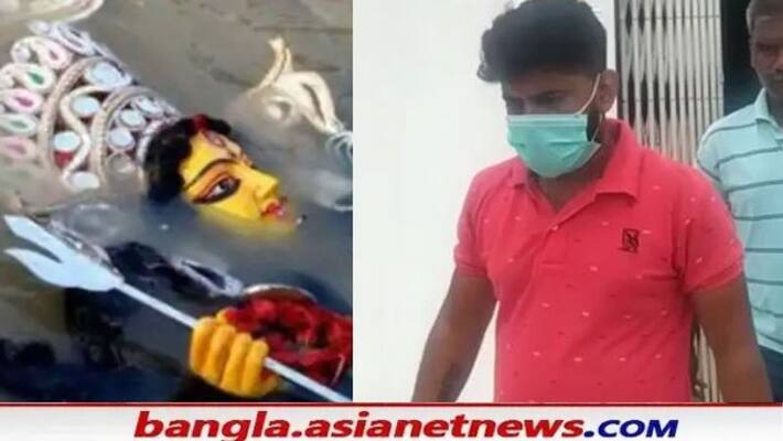 A civic volunteer has hit a government employee in the head over the issue of Durga idol immersion RTB A civic volunteer has hit a government employee in the head over the issue of Durga idol immersion RTB