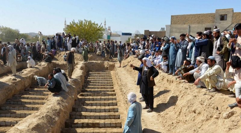 mass funeral held for suicide bomb victimes in afghanistan