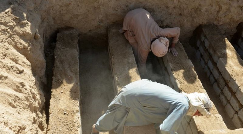 mass funeral held for suicide bomb victimes in afghanistan