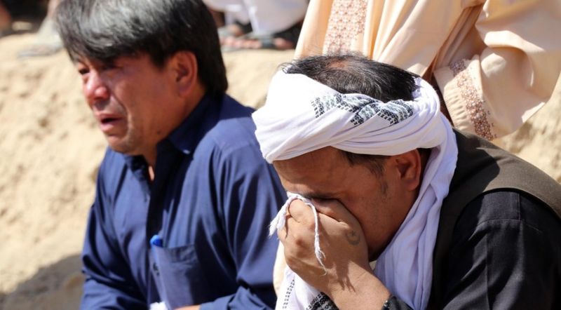 mass funeral held for suicide bomb victimes in afghanistan
