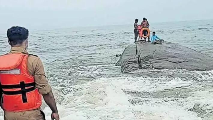 young man in thottada rescued from sea rock by fire force young man in thottada rescued from sea rock by fire force