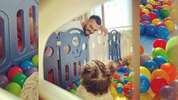 Anushka Sharma shares cute pic of husband virat Kohli playing with daughter vamika Anushka Sharma shares cute pic of husband virat Kohli playing with daughter vamika