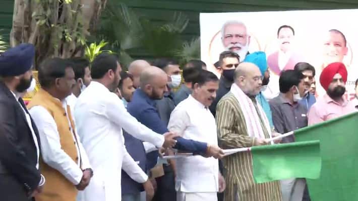 Amit Shah flags off Modi Van under BJP Seva hi Sangathan Amit Shah flags off Modi Van under BJP Seva hi Sangathan