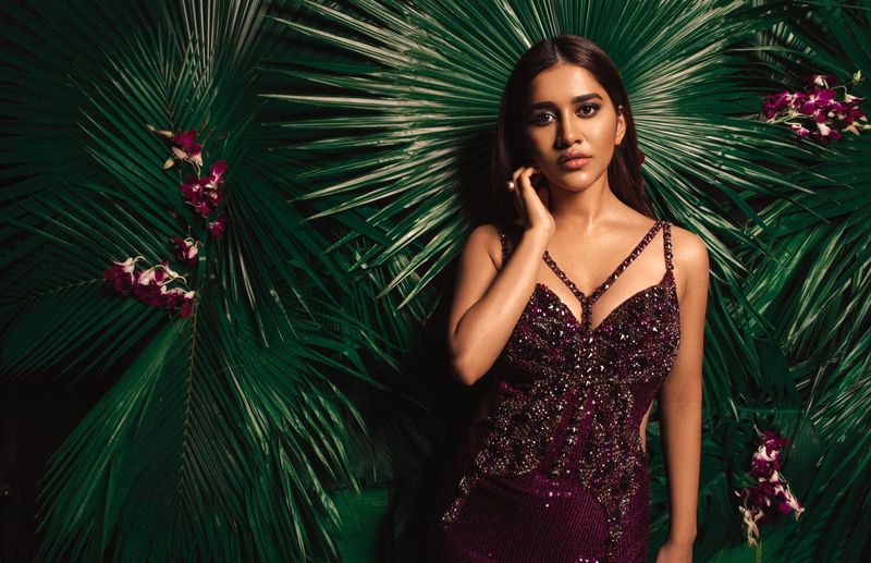 nabha natesh goes bold in purple color trendy wear showcasing her curves
