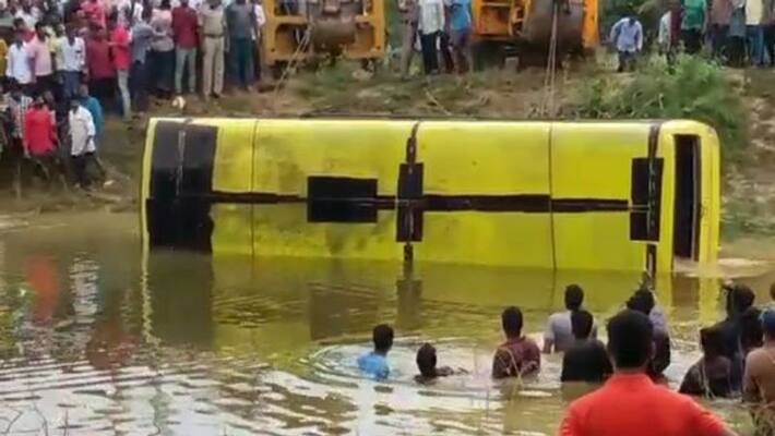 school bus slips into pond in srikakulam district school bus slips into pond in srikakulam district