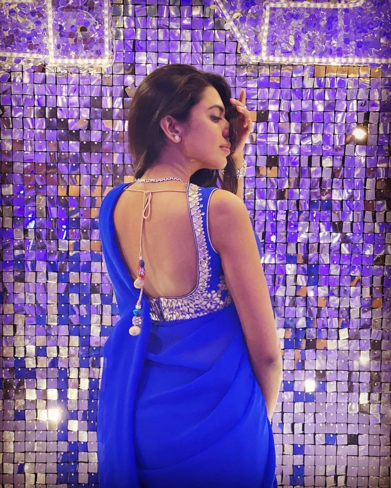 star kid shivani rajashekar rises heat in blue saree and deep neck jacket