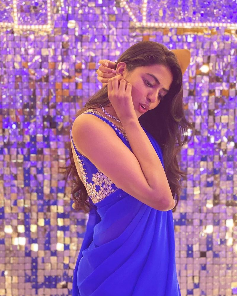star kid shivani rajashekar rises heat in blue saree and deep neck jacket