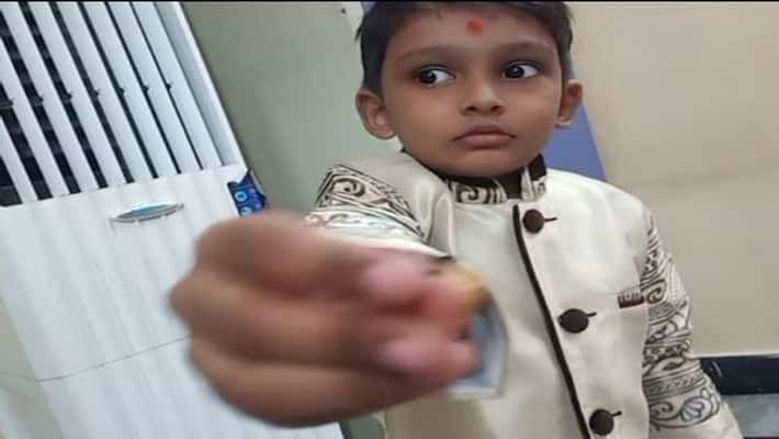 five years old child donate Gold to Yadadri Temple for gold plating five years old child donate Gold to Yadadri Temple for gold plating