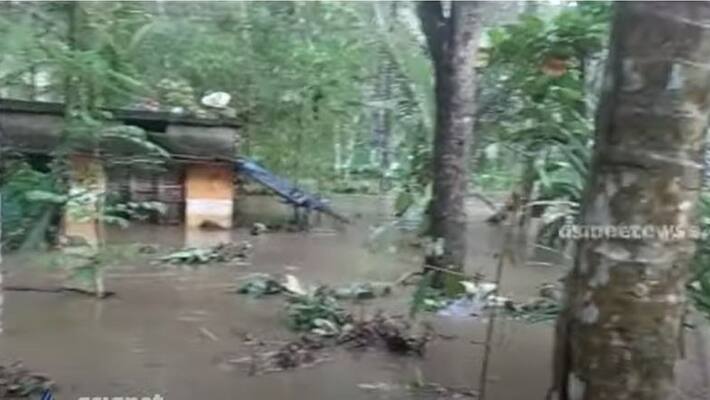 One house was completely destroyed and 15 houses were partially destroyed due to the floods in Vithura One house was completely destroyed and 15 houses were partially destroyed due to the floods in Vithura