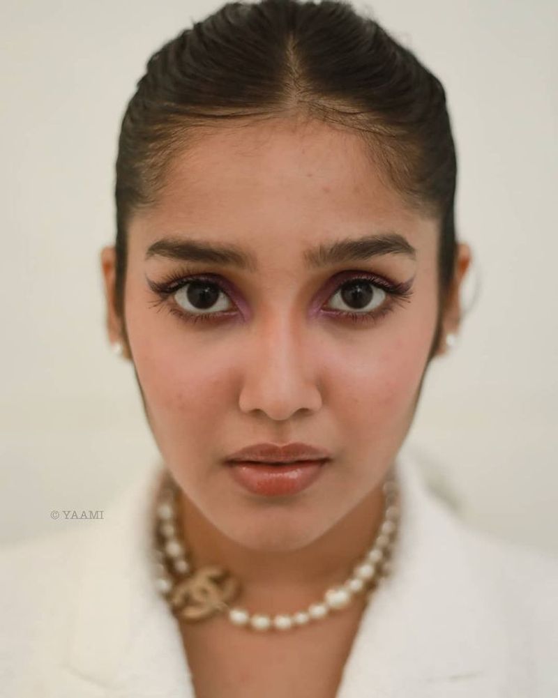 Actor Ajith Reel daughter anikha surendran latest white coat hot photos