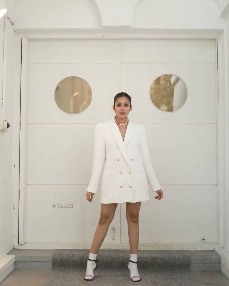 Actor Ajith Reel daughter anikha surendran latest white coat hot photos