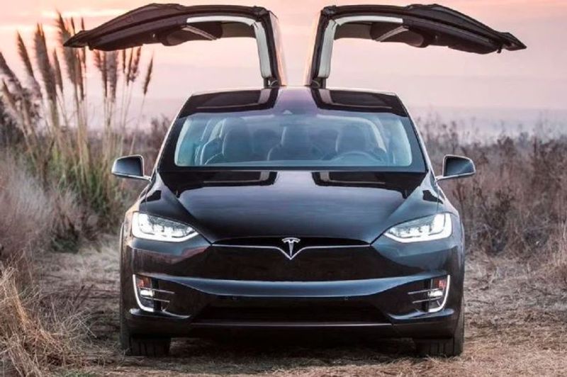Tesla should make electric car in India, then you will get tax benefits says NITI Aayog