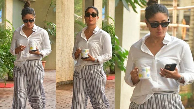 kareena kapoor spotted in untidy hair wearing shirt and striped pants outside home