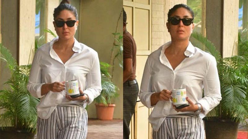 kareena kapoor spotted in untidy hair wearing shirt and striped pants outside home