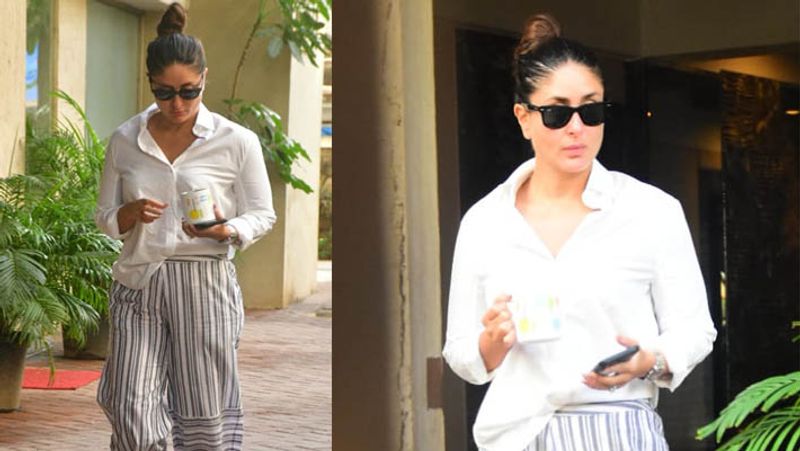 kareena kapoor spotted in untidy hair wearing shirt and striped pants outside home