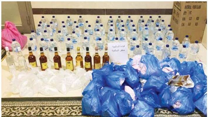 two asians arrested in Kuwait with 120 bottles of liquor two asians arrested in Kuwait with 120 bottles of liquor