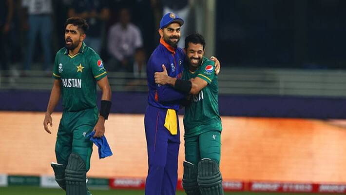 T20 world cup 2021: ind vs pak virat kohli congratulates azam, rizwan and ms dhoni interacts with pakistani players T20 world cup 2021: ind vs pak virat kohli congratulates azam, rizwan and ms dhoni interacts with pakistani players