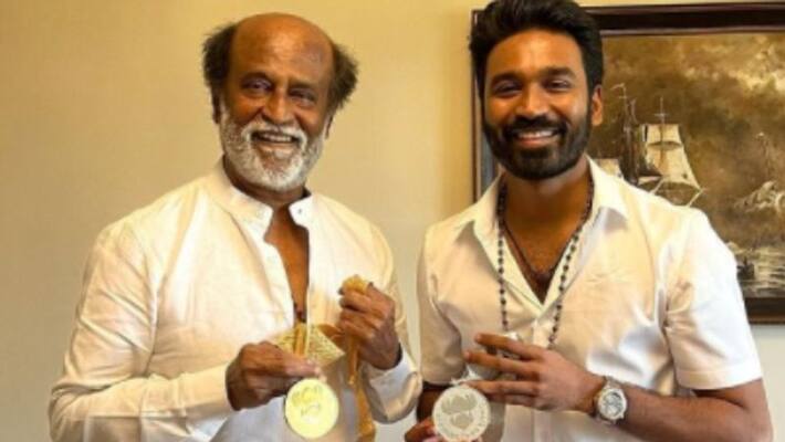 Artist Dhanush share his photo with Rajinikanth Artist Dhanush share his photo with Rajinikanth